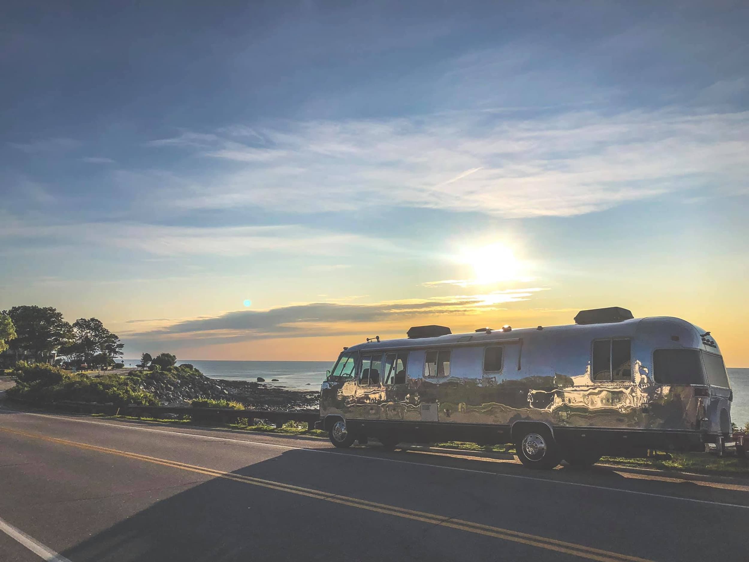 Silver Wander Airstream by the water